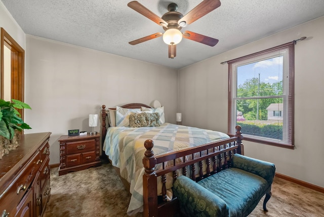 757 Acorn Dr, Clarksville, TN 37043 - carpeted bedroom featuring a textured ceiling, baseboards, and ceiling fan