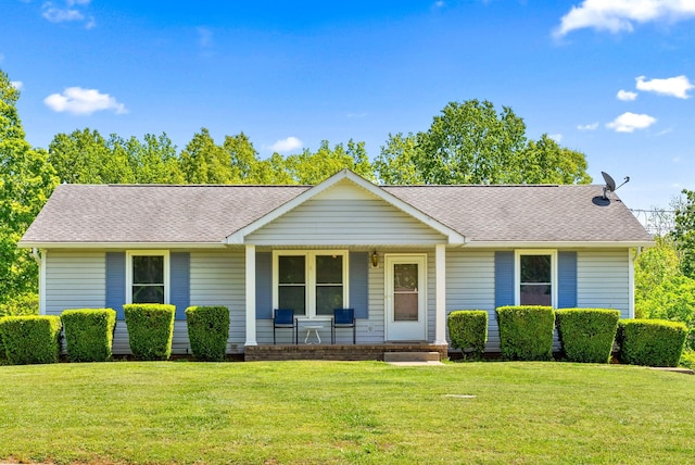 757 Acorn Dr, Clarksville, TN 37043 - ranch-style house with a shingled roof, a porch, and a front yard