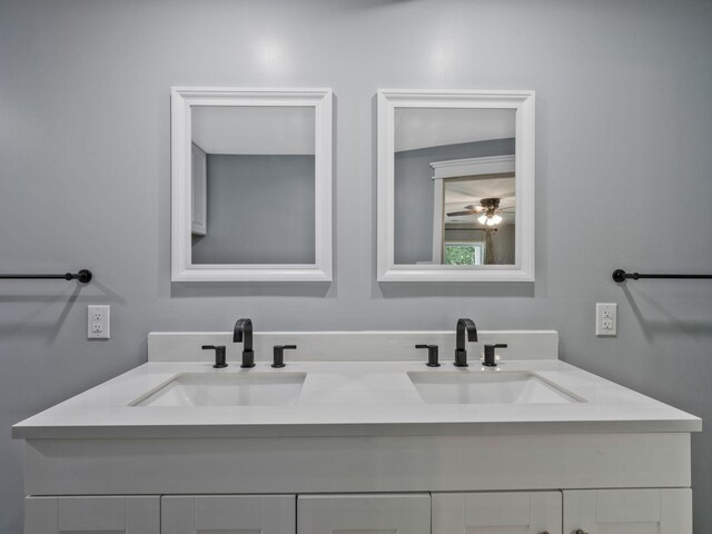 3120 Trenton Rd, Clarksville, TN 37040 - full bathroom with double vanity, a sink, and a ceiling fan