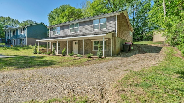 3120 Trenton Rd, Clarksville, TN 37040 - view of front of home featuring driveway, a front yard, and covered porch