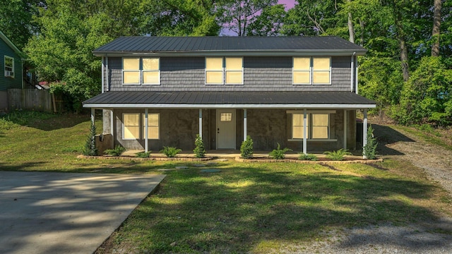 3120 Trenton Rd, Clarksville, TN 37040 - view of front of property with a porch, a front lawn, and metal roof