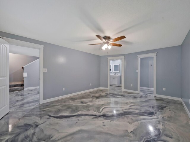 3120 Trenton Rd, Clarksville, TN 37040 - empty room featuring a ceiling fan, baseboards, and concrete flooring