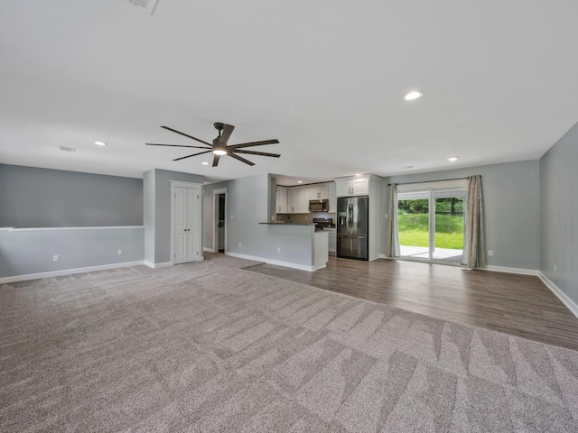 3120 Trenton Rd, Clarksville, TN 37040 - unfurnished living room with baseboards, a ceiling fan, carpet, and recessed lighting