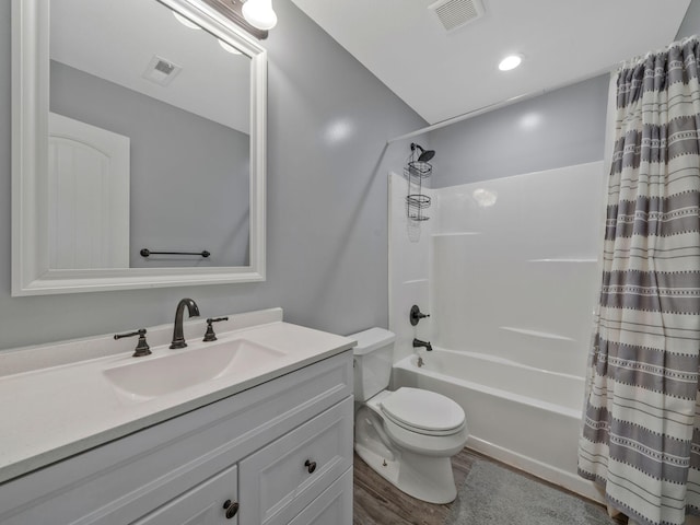 3120 Trenton Rd, Clarksville, TN 37040 - bathroom with visible vents, wood finished floors, shower / bath combination with curtain, and toilet