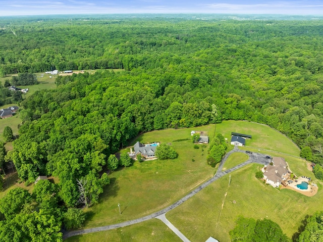 aerial view featuring a view of trees