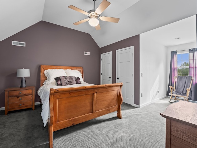 bedroom with carpet, lofted ceiling, and visible vents