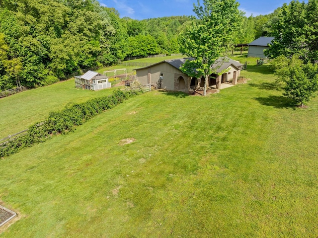 aerial view featuring a view of trees