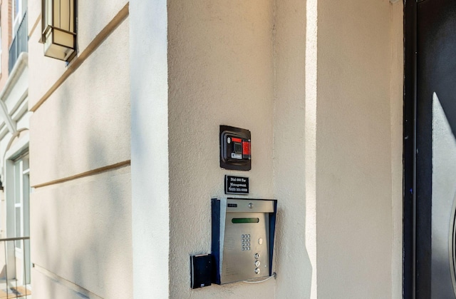 3000 Vanderbilt Pl Unit 118, Nashville, TN 37212 - details with a fire alarm and stucco siding