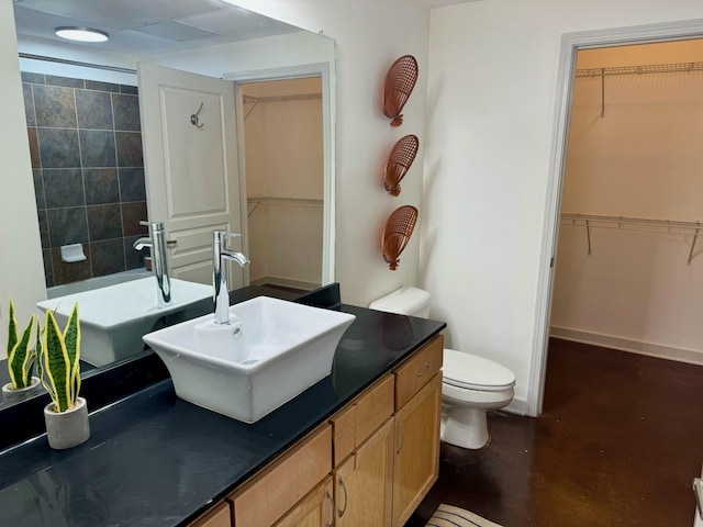 3000 Vanderbilt Pl Unit 118, Nashville, TN 37212 - full bath featuring toilet, concrete flooring, a spacious closet, and vanity