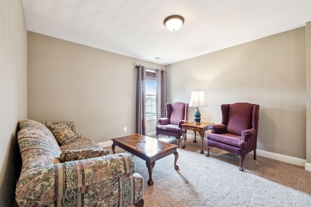 living area with baseboards, carpet flooring, and visible vents