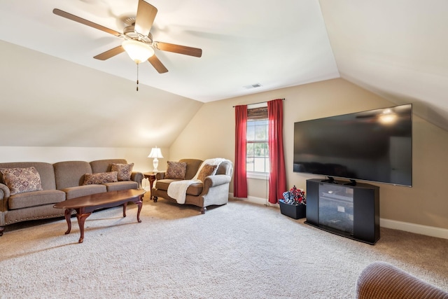 living area featuring carpet flooring, ceiling fan, baseboards, lofted ceiling, and visible vents