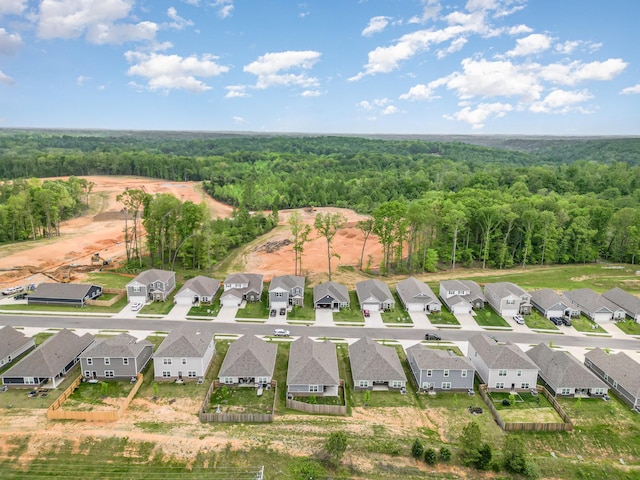 aerial view with a forest view and a residential view