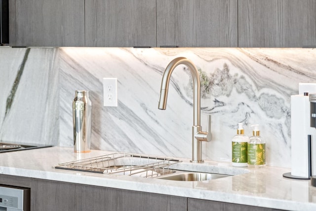 room details with light countertops and gray cabinetry
