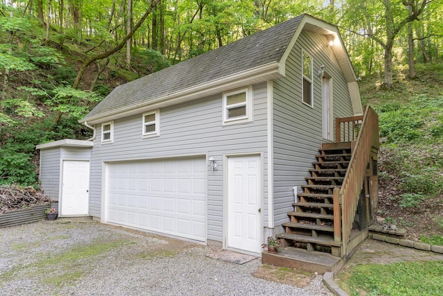 garage with driveway