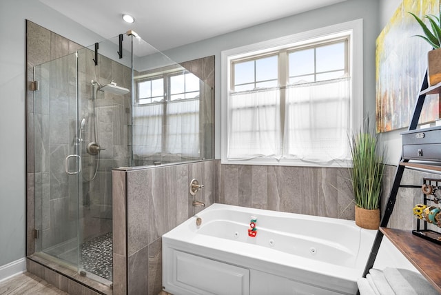 1005 Felts Dr, Clarksville, TN 37043 - bathroom with a jetted tub and a shower stall