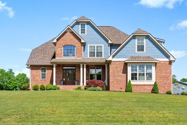 1005 Felts Dr, Clarksville, TN 37043 - craftsman-style home with brick siding and a front lawn