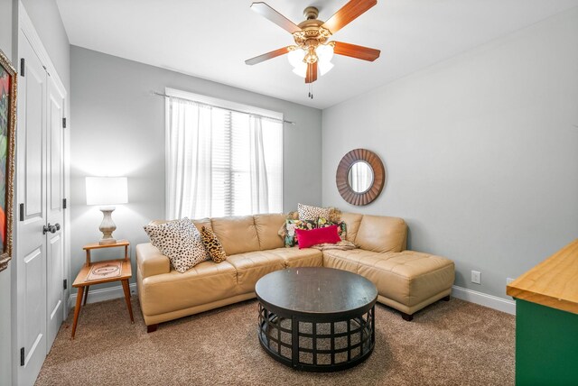 1005 Felts Dr, Clarksville, TN 37043 - living area featuring carpet floors, baseboards, and a ceiling fan