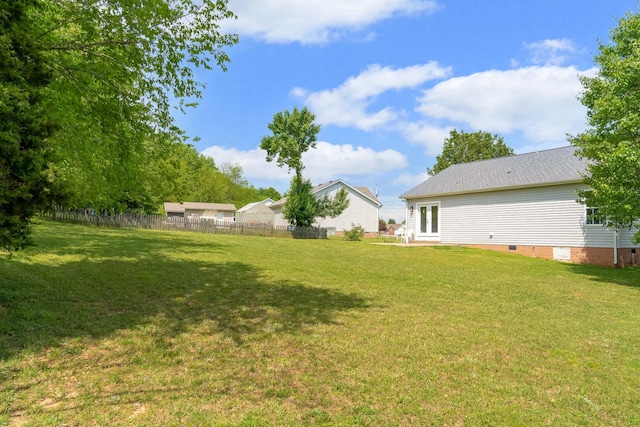 view of yard featuring fence
