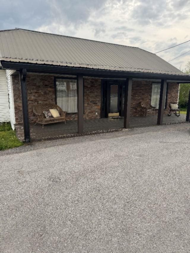500 Brown St, Celina, TN 38551 - view of front of house featuring metal roof and a porch
