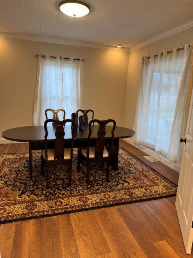 500 Brown St, Celina, TN 38551 - dining area featuring wood finished floors and ornamental molding