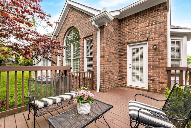 deck featuring a yard