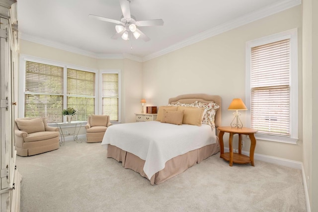 bedroom featuring baseboards, light colored carpet, ornamental molding, and ceiling fan