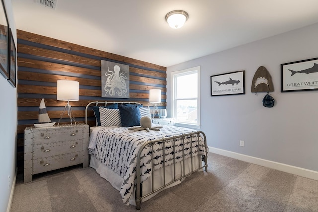 2550 Ashford Dr, Mount Juliet, TN 37122 - carpeted bedroom featuring visible vents, baseboards, and wooden walls