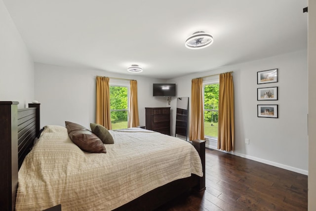 790 Noah Dr, Hohenwald, TN 38462 - bedroom featuring baseboards and dark wood finished floors