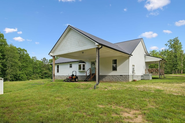 790 Noah Dr, Hohenwald, TN 38462 - back of house with a yard and cooling unit