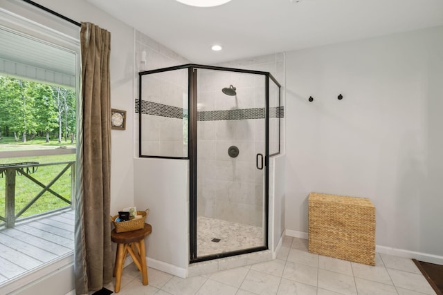 790 Noah Dr, Hohenwald, TN 38462 - full bathroom with tile patterned flooring, baseboards, and a shower stall