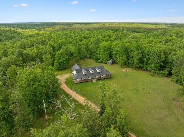 790 Noah Dr, Hohenwald, TN 38462 - aerial view featuring a wooded view
