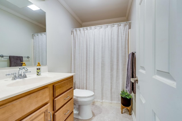 bathroom with vanity, ornamental molding, tile patterned floors, and toilet