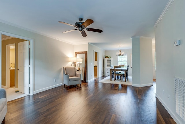 sitting room with baseboards, ornamental molding, ceiling fan with notable chandelier, and dark wood-style flooring