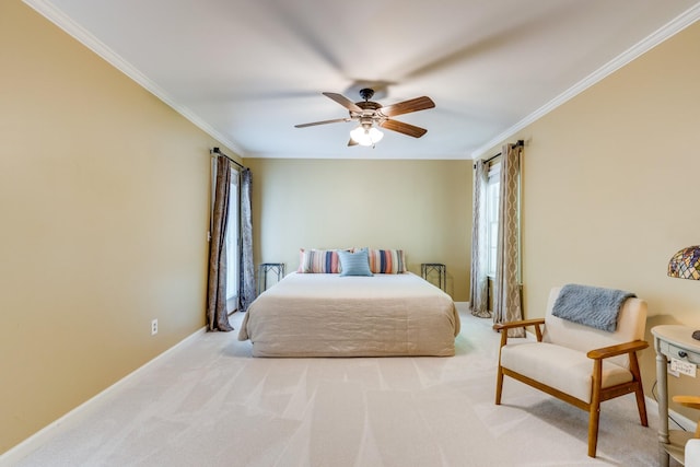 bedroom featuring crown molding, carpet flooring, baseboards, and ceiling fan