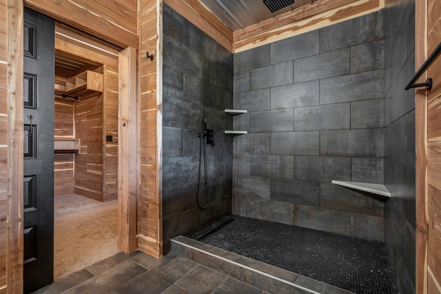 full bathroom featuring a tile shower