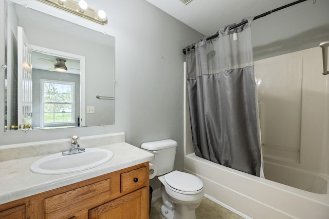 bathroom featuring toilet, shower / bathtub combination with curtain, tile patterned flooring, and vanity