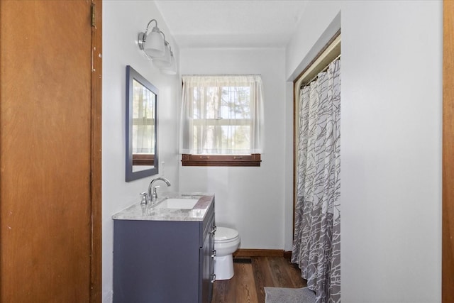 1712 Franklin Pike, Lewisburg, TN 37091 - bathroom with vanity, toilet, a shower with shower curtain, baseboards, and wood finished floors