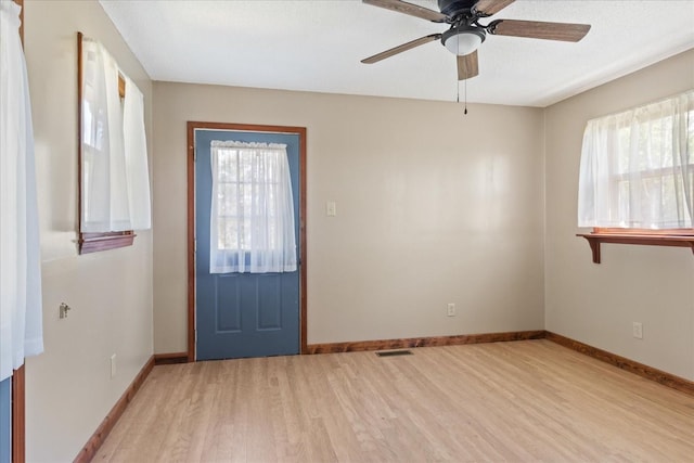 1712 Franklin Pike, Lewisburg, TN 37091 - interior space with light wood-style floors, visible vents, a ceiling fan, and a wealth of natural light