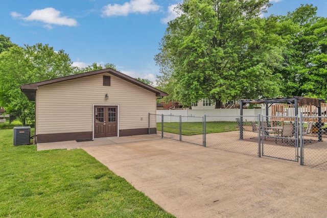 exterior space with a pergola, central AC, fence, and a gate