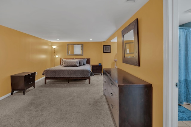 bedroom featuring recessed lighting, baseboards, visible vents, and light carpet