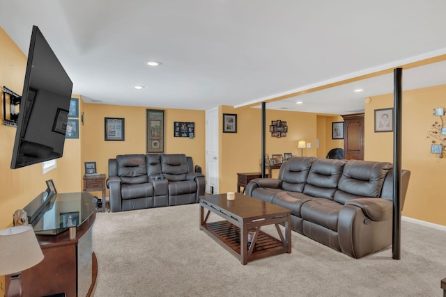 living room with recessed lighting and carpet flooring