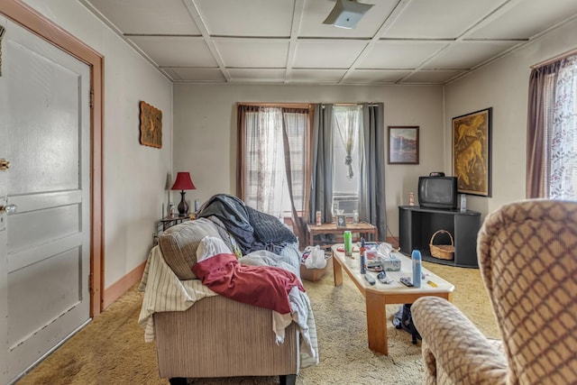 sitting room with carpet floors