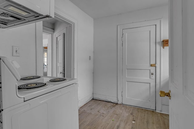 washroom with light wood-type flooring