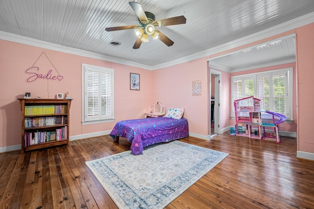 bedroom with baseboards, ornamental molding, hardwood / wood-style floors, and ceiling fan