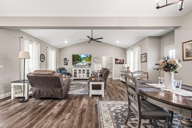 living area with baseboards, ceiling fan, dark wood-style floors, and vaulted ceiling