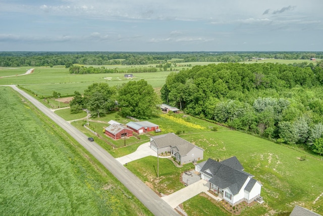birds eye view of property featuring a rural view