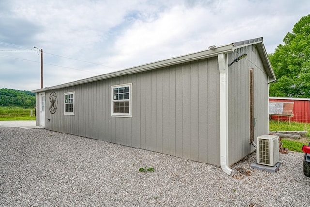 view of outbuilding with ac unit