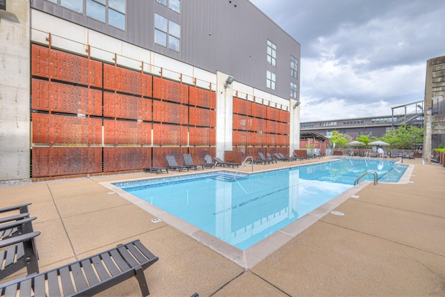 pool featuring a patio