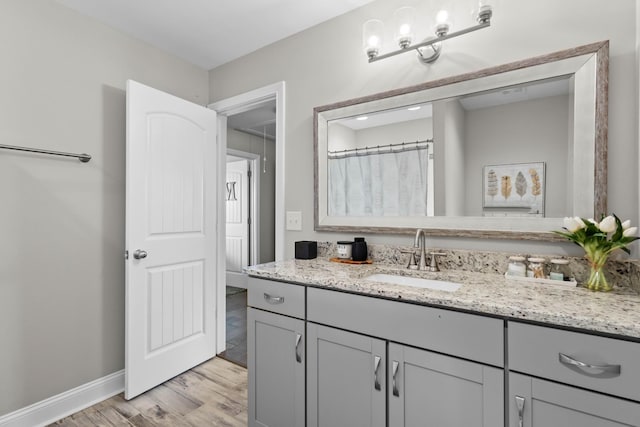 1132 Upland Ter, Clarksville, TN 37043 - full bathroom with baseboards, wood finished floors, and vanity