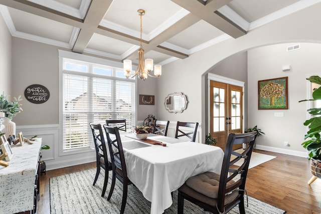 1132 Upland Ter, Clarksville, TN 37043 - dining room with visible vents, dark wood finished floors, french doors, arched walkways, and coffered ceiling